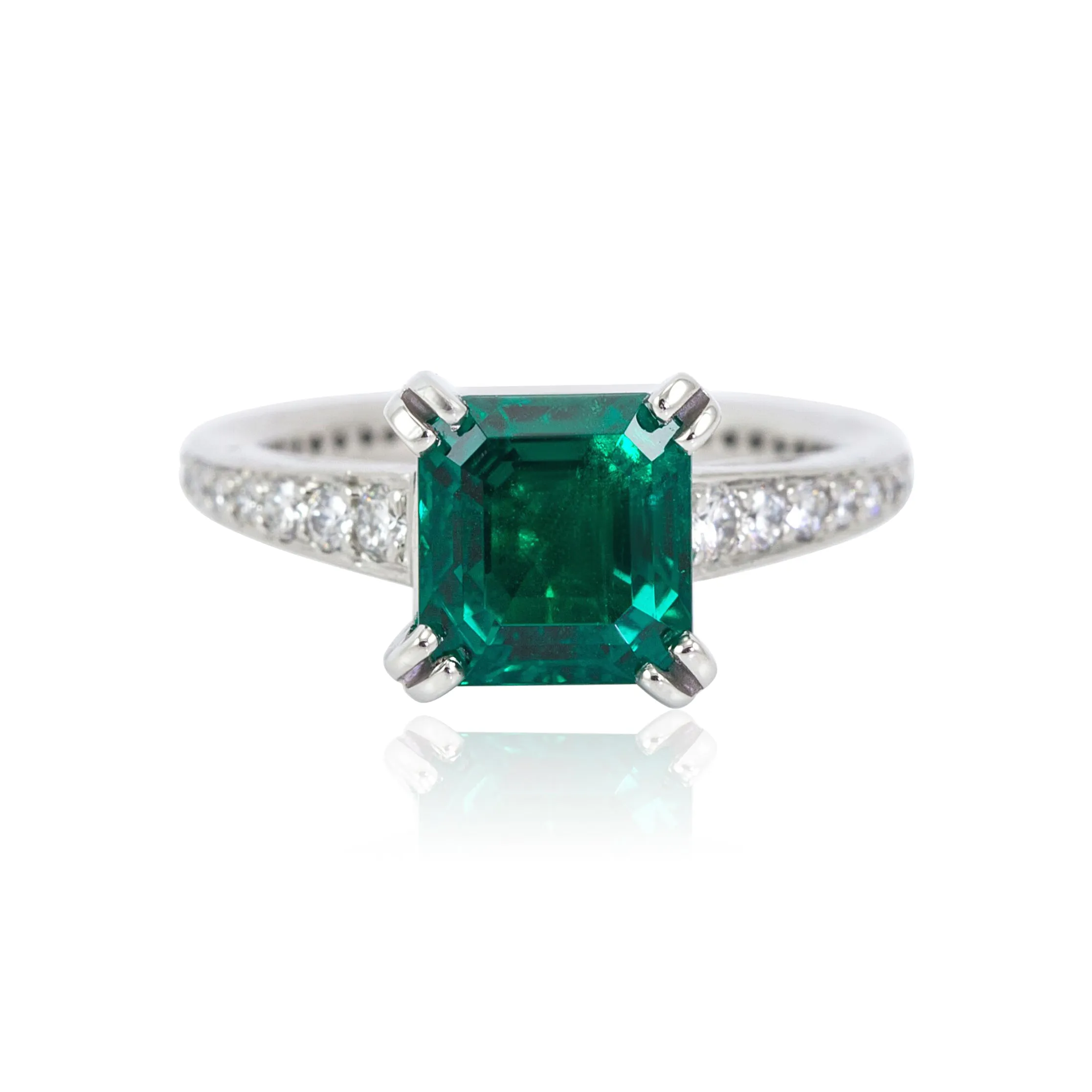 Platinum Emerald and Round Brilliant Diamond Ring 0.44CTW